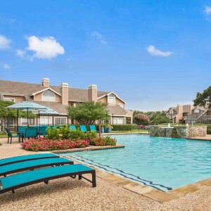 beautiful pool with lounge chairs