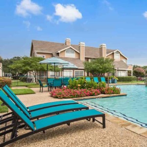beautiful pool with lounge chairs
