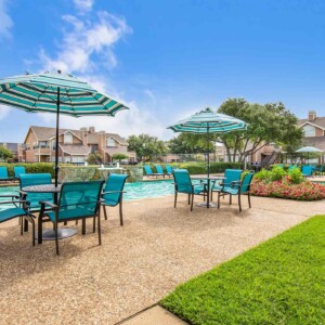 pool with umbrellas and chairs