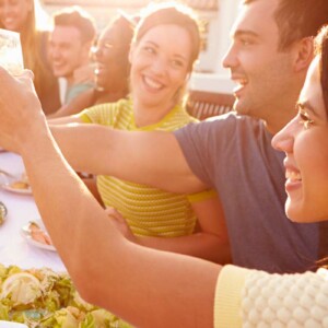 friends toasting at table