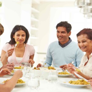 family sitting at a table together